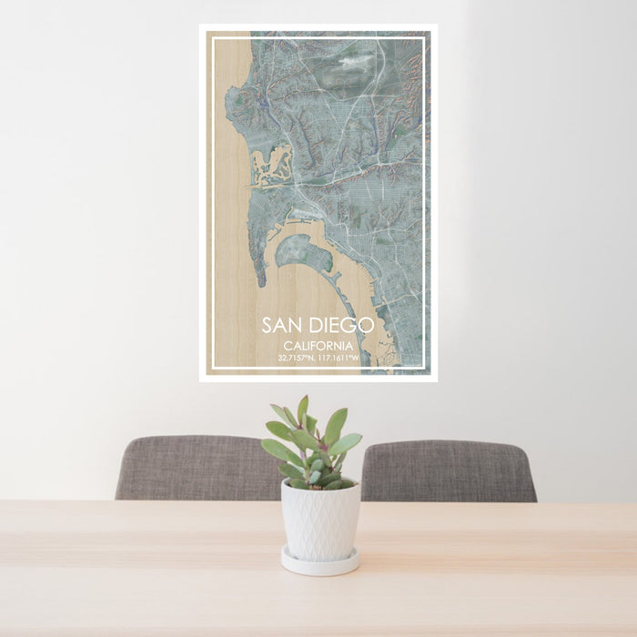 24x36 San Diego California Map Print Portrait Orientation in Afternoon Style Behind 2 Chairs Table and Potted Plant