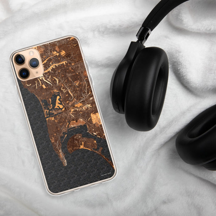 Custom San Diego California Map Phone Case in Ember on Table with Black Headphones