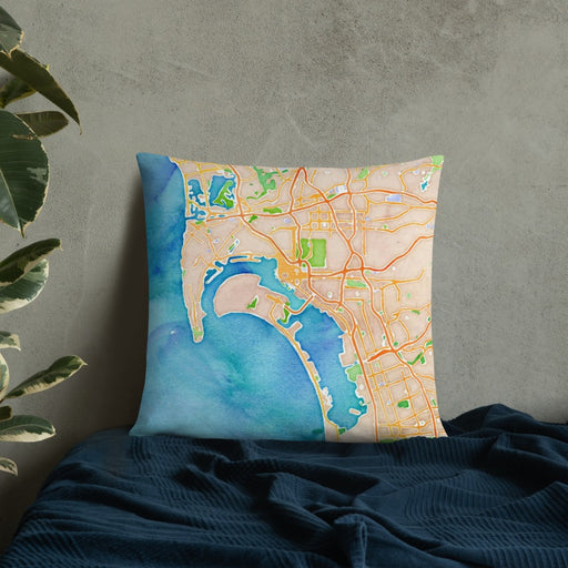 Custom San Diego California Map Throw Pillow in Watercolor on Bedding Against Wall