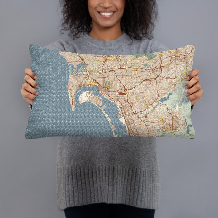 Person holding 20x12 Custom San Diego California Map Throw Pillow in Woodblock