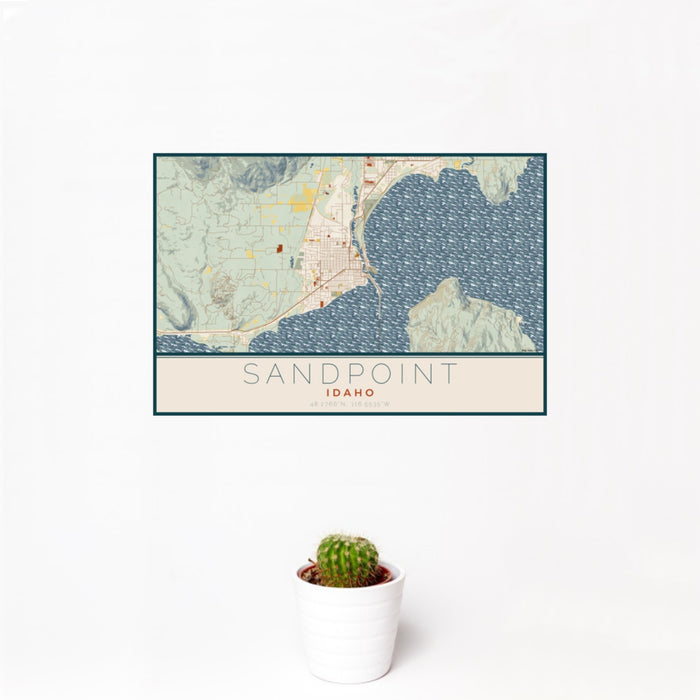 12x18 Sandpoint Idaho Map Print Landscape Orientation in Woodblock Style With Small Cactus Plant in White Planter