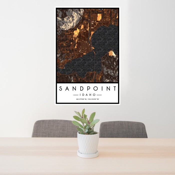 24x36 Sandpoint Idaho Map Print Portrait Orientation in Ember Style Behind 2 Chairs Table and Potted Plant