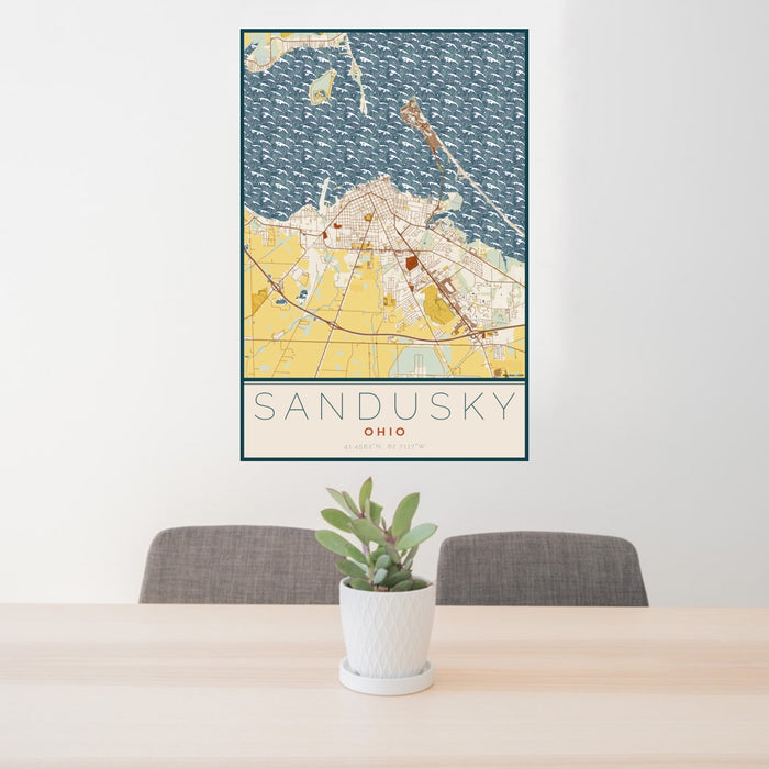 24x36 Sandusky Ohio Map Print Portrait Orientation in Woodblock Style Behind 2 Chairs Table and Potted Plant