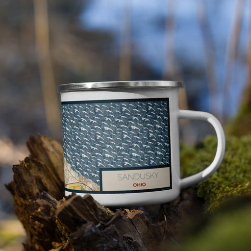Right View Custom Sandusky Ohio Map Enamel Mug in Woodblock on Grass With Trees in Background