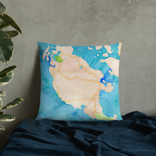 Custom San Juan Island Washington Map Throw Pillow in Watercolor on Bedding Against Wall