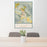 24x36 San Luis Obispo California Map Print Portrait Orientation in Woodblock Style Behind 2 Chairs Table and Potted Plant