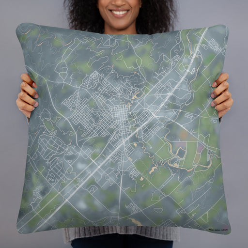 Person holding 22x22 Custom San Marcos Texas Map Throw Pillow in Afternoon