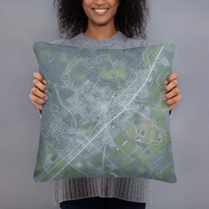 Person holding 18x18 Custom San Marcos Texas Map Throw Pillow in Afternoon
