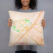 Person holding 18x18 Custom San Marcos Texas Map Throw Pillow in Watercolor
