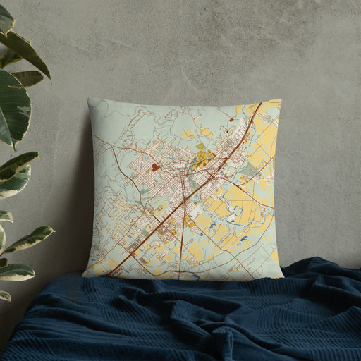Custom San Marcos Texas Map Throw Pillow in Woodblock on Bedding Against Wall