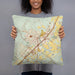 Person holding 18x18 Custom San Marcos Texas Map Throw Pillow in Woodblock