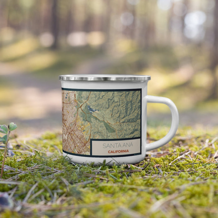 Right View Custom Santa Ana California Map Enamel Mug in Woodblock on Grass With Trees in Background