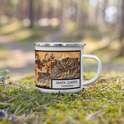 Right View Custom Santa Clarita California Map Enamel Mug in Ember on Grass With Trees in Background