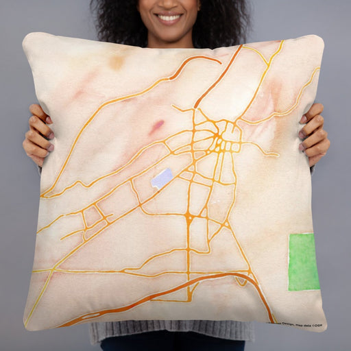 Person holding 22x22 Custom Santa Fe New Mexico Map Throw Pillow in Watercolor