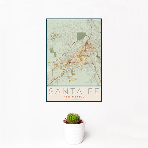 12x18 Santa Fe New Mexico Map Print Portrait Orientation in Woodblock Style With Small Cactus Plant in White Planter