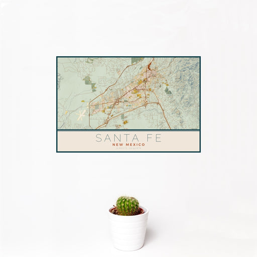 12x18 Santa Fe New Mexico Map Print Landscape Orientation in Woodblock Style With Small Cactus Plant in White Planter