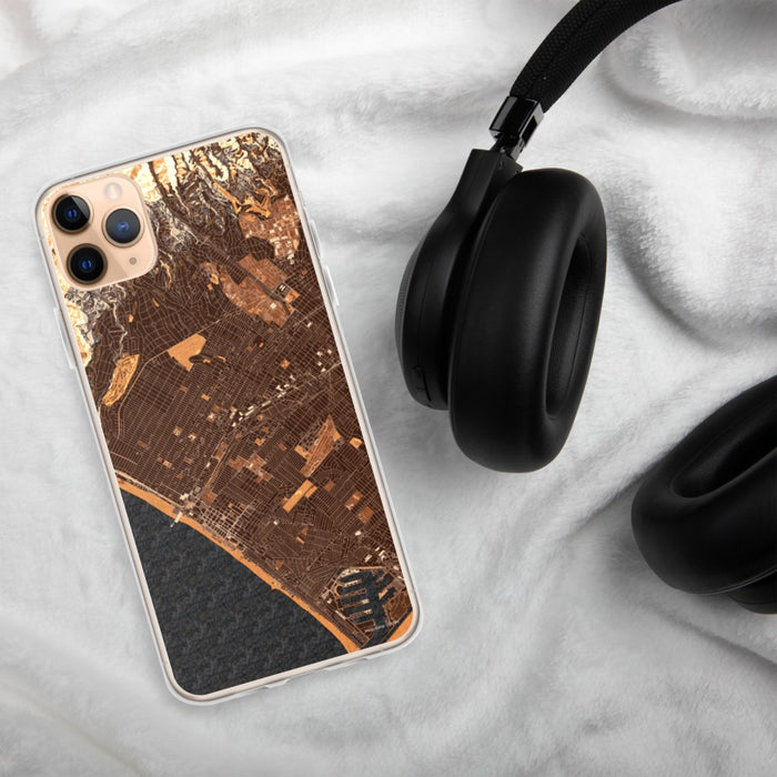 Custom Santa Monica California Map Phone Case in Ember on Table with Black Headphones