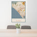 24x36 Santa Monica California Map Print Portrait Orientation in Woodblock Style Behind 2 Chairs Table and Potted Plant