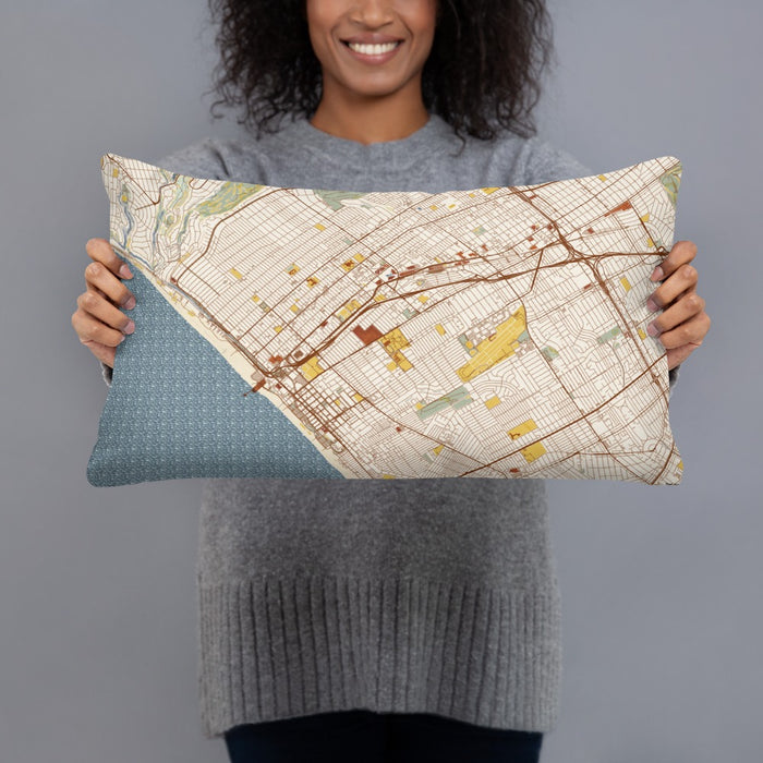 Person holding 20x12 Custom Santa Monica California Map Throw Pillow in Woodblock
