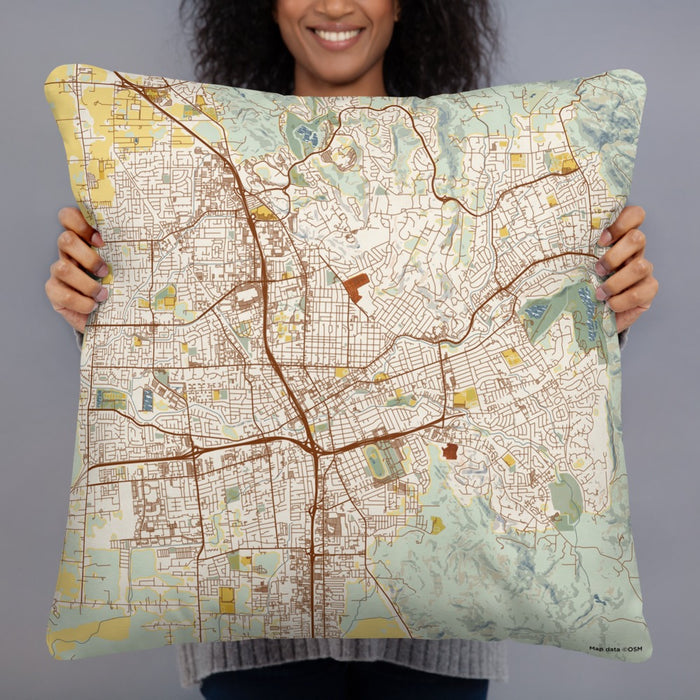 Person holding 22x22 Custom Santa Rosa California Map Throw Pillow in Woodblock