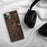 Custom Saranac Lake New York Map Phone Case in Ember on Table with Black Headphones