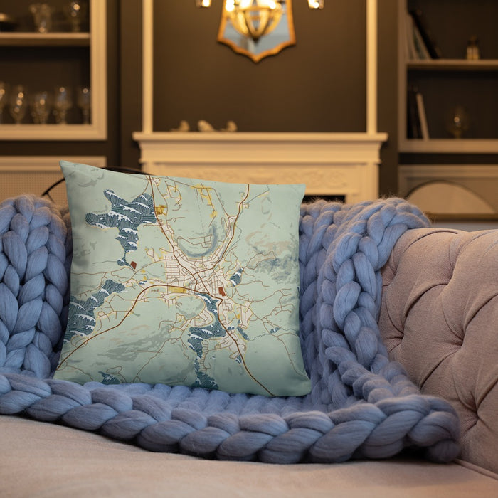 Custom Saranac Lake New York Map Throw Pillow in Woodblock on Cream Colored Couch