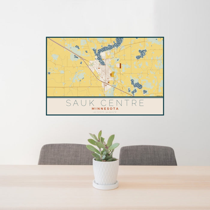 24x36 Sauk Centre Minnesota Map Print Lanscape Orientation in Woodblock Style Behind 2 Chairs Table and Potted Plant