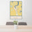 24x36 Sauk Centre Minnesota Map Print Portrait Orientation in Woodblock Style Behind 2 Chairs Table and Potted Plant