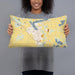 Person holding 20x12 Custom Sauk Centre Minnesota Map Throw Pillow in Woodblock