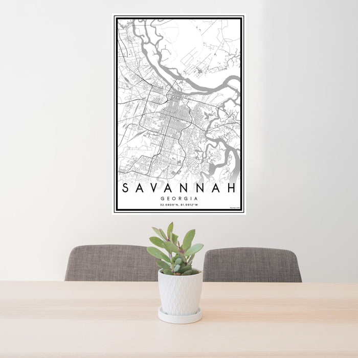 24x36 Savannah Georgia Map Print Portrait Orientation in Classic Style Behind 2 Chairs Table and Potted Plant
