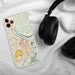 Custom Savannah Georgia Map Phone Case in Woodblock on Table with Black Headphones