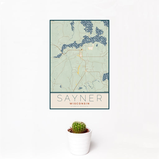 12x18 Sayner Wisconsin Map Print Portrait Orientation in Woodblock Style With Small Cactus Plant in White Planter