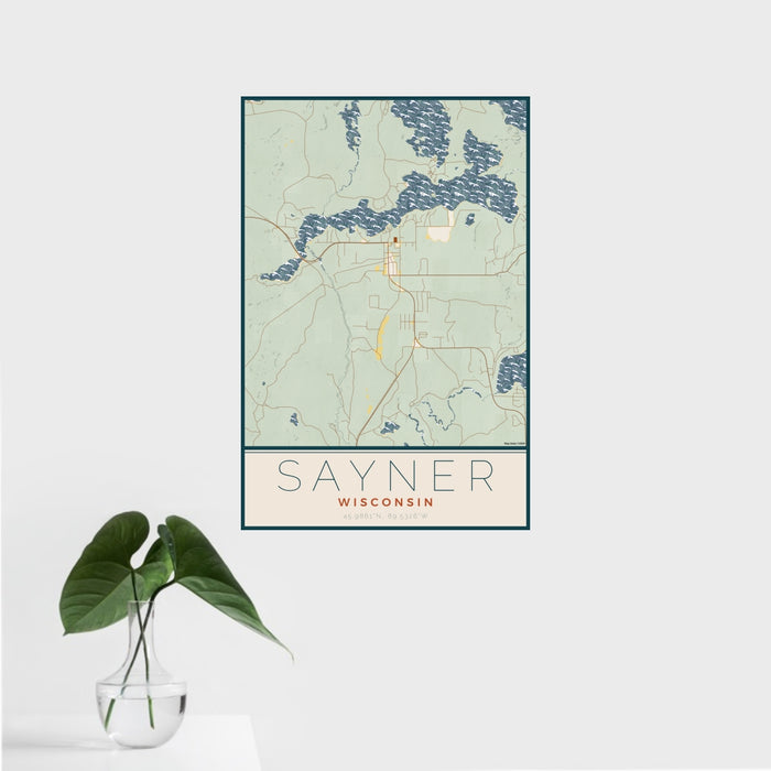 16x24 Sayner Wisconsin Map Print Portrait Orientation in Woodblock Style With Tropical Plant Leaves in Water