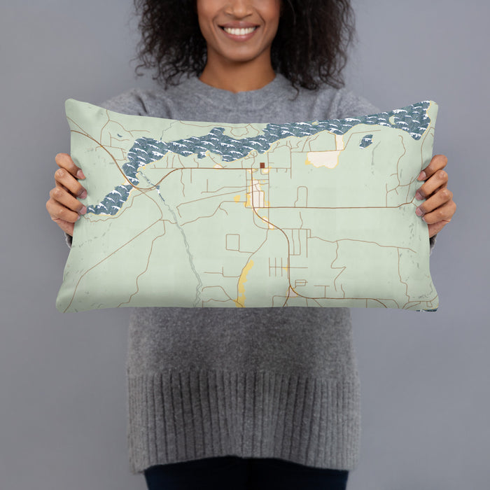 Person holding 20x12 Custom Sayner Wisconsin Map Throw Pillow in Woodblock