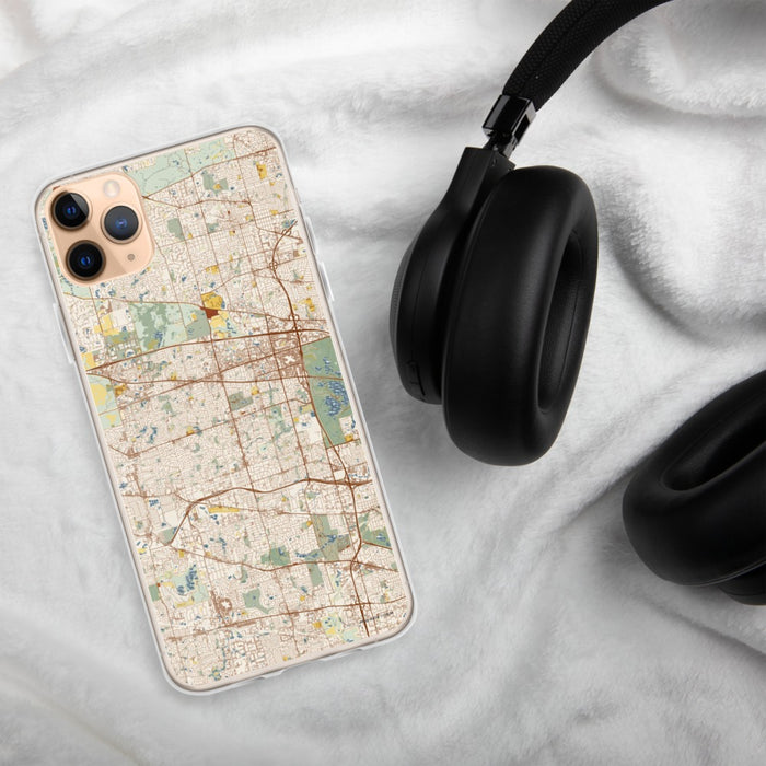 Custom Schaumburg Illinois Map Phone Case in Woodblock on Table with Black Headphones
