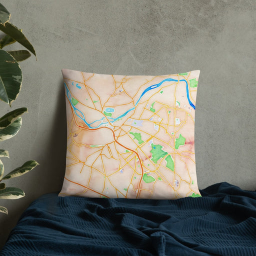 Custom Schenectady New York Map Throw Pillow in Watercolor on Bedding Against Wall