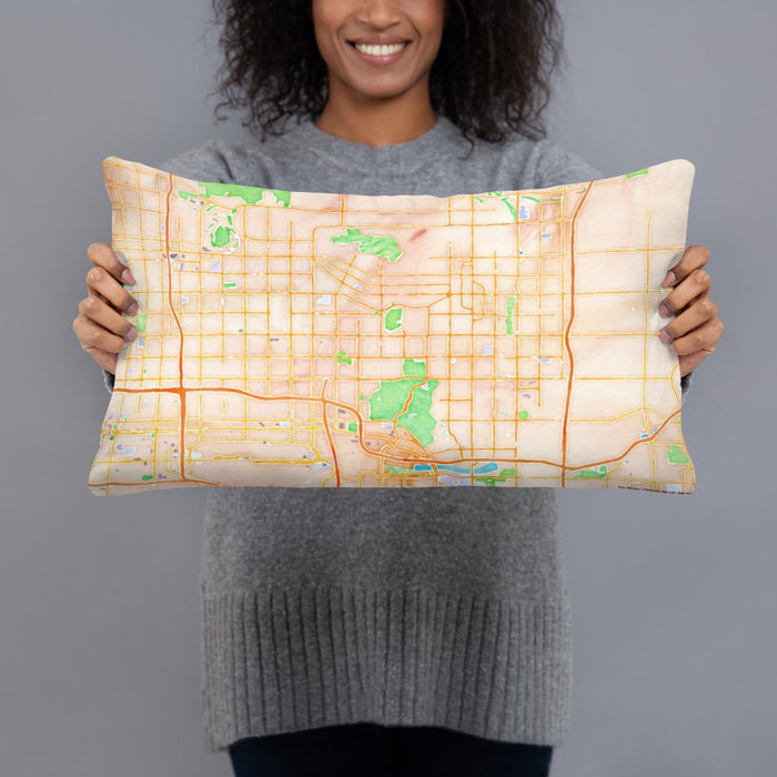 Person holding 20x12 Custom Scottsdale Arizona Map Throw Pillow in Watercolor