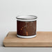 Front View Custom Searchlight Nevada Map Enamel Mug in Ember on Cutting Board