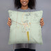 Person holding 18x18 Custom Searchlight Nevada Map Throw Pillow in Woodblock