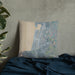 Custom Seaside Oregon Map Throw Pillow in Afternoon on Bedding Against Wall