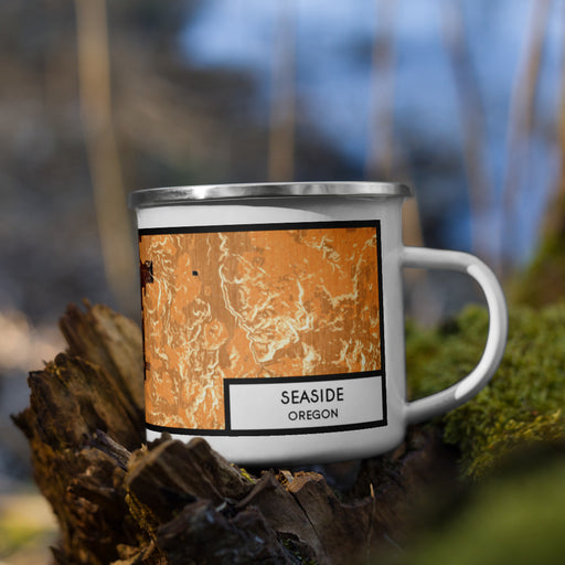 Right View Custom Seaside Oregon Map Enamel Mug in Ember on Grass With Trees in Background