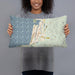 Person holding 20x12 Custom Seaside Oregon Map Throw Pillow in Woodblock