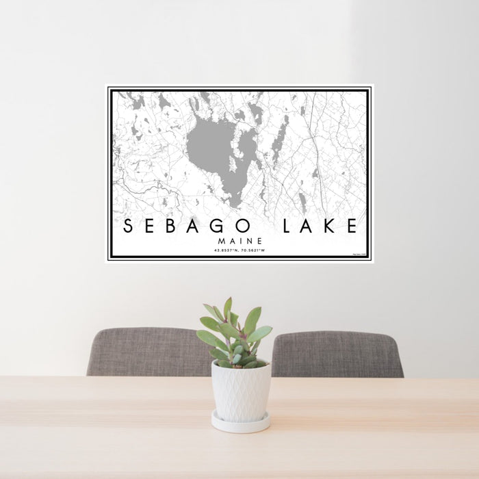 24x36 Sebago Lake Maine Map Print Lanscape Orientation in Classic Style Behind 2 Chairs Table and Potted Plant