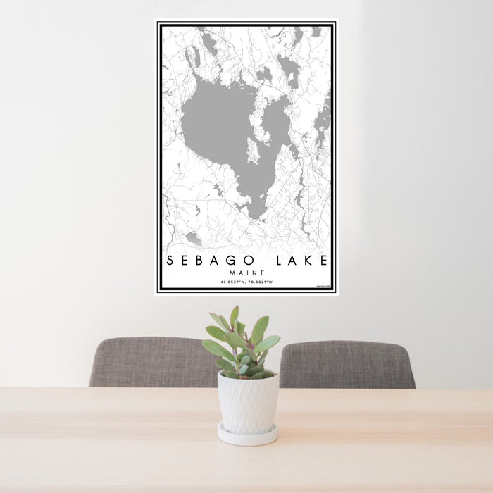 24x36 Sebago Lake Maine Map Print Portrait Orientation in Classic Style Behind 2 Chairs Table and Potted Plant