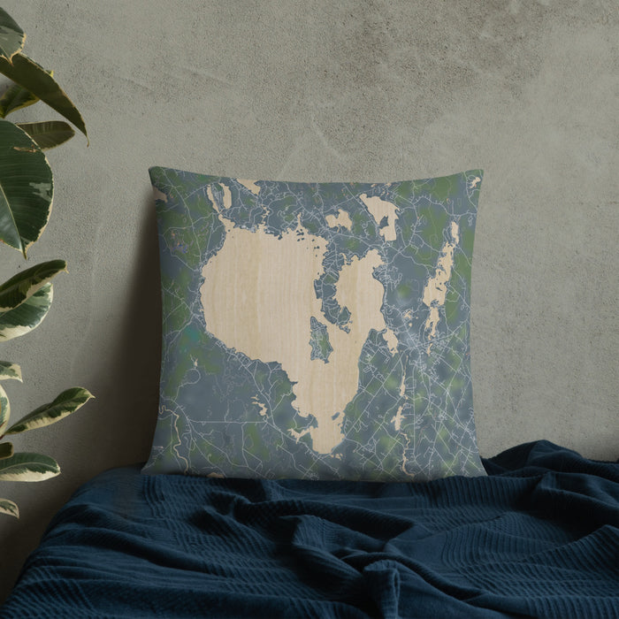 Custom Sebago Lake Maine Map Throw Pillow in Afternoon on Bedding Against Wall