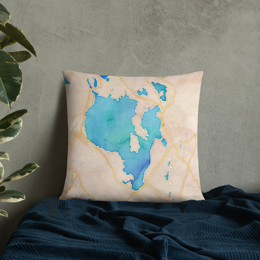 Custom Sebago Lake Maine Map Throw Pillow in Watercolor on Bedding Against Wall