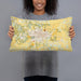 Person holding 20x12 Custom Sedalia Missouri Map Throw Pillow in Woodblock