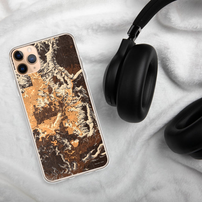 Custom Sedona Arizona Map Phone Case in Ember on Table with Black Headphones