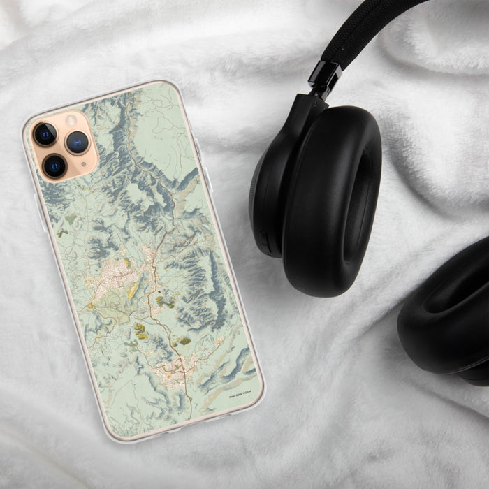 Custom Sedona Arizona Map Phone Case in Woodblock on Table with Black Headphones