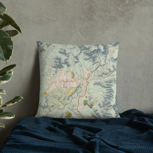 Custom Sedona Arizona Map Throw Pillow in Woodblock on Bedding Against Wall